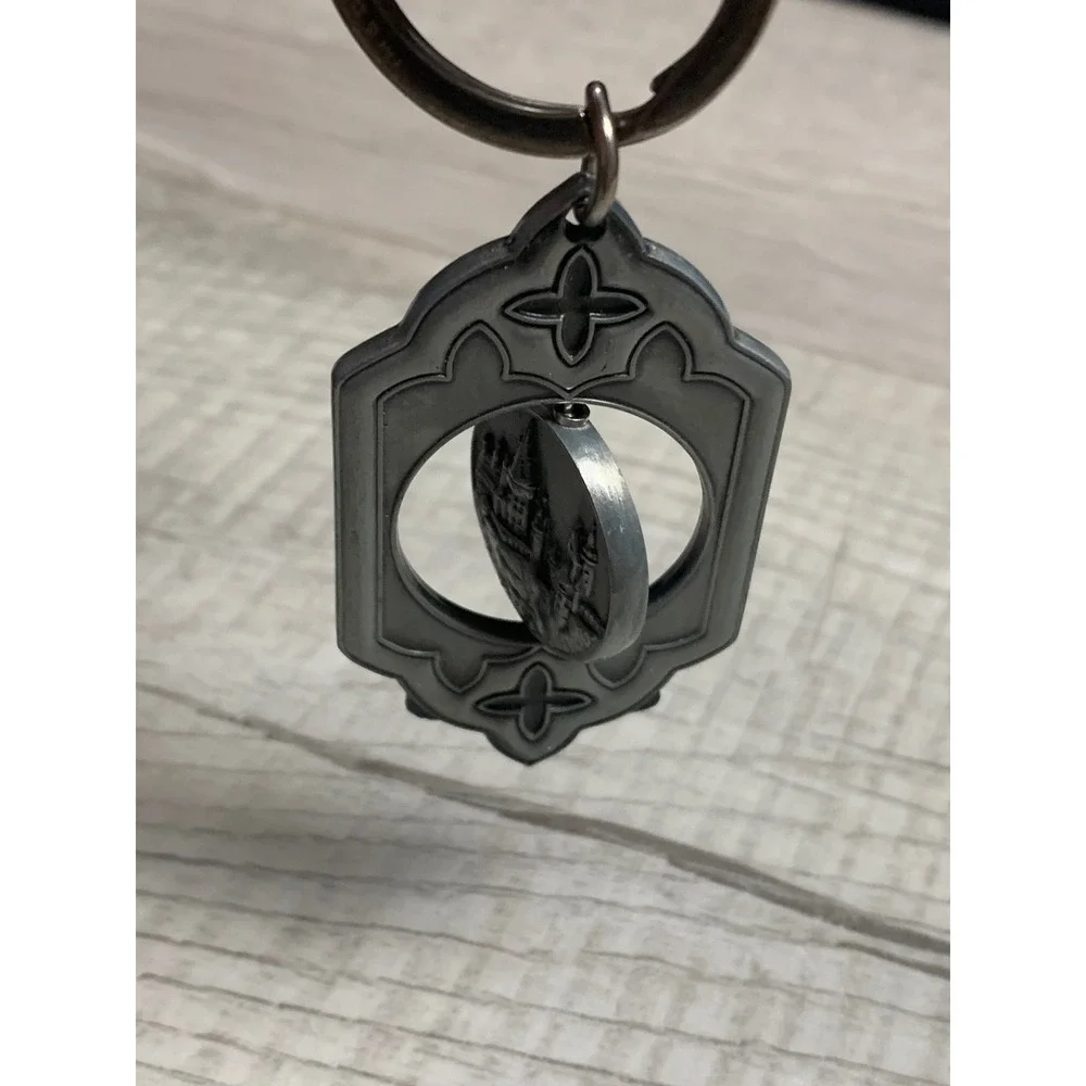 Universal Studios Harry Potter Spinning Hogwarts Keychain Zoe Nameplate Pewter